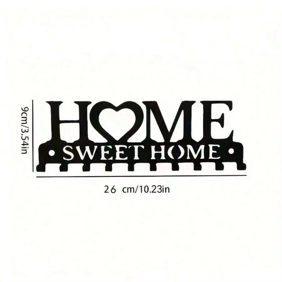 Black wall mounted key holder with decorative Home Sweet Home design