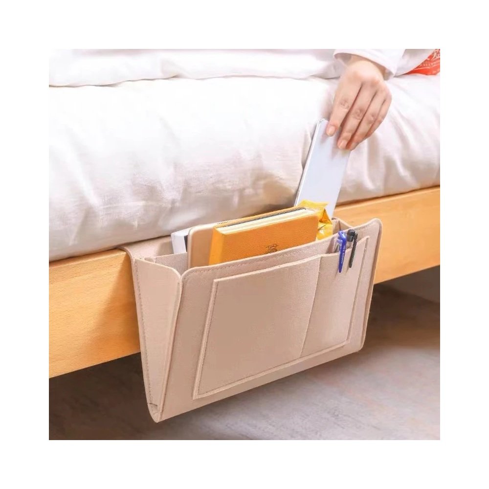 Bedside caddy organizer attached to bed
