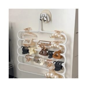 Hair accessory organizer hanging on wall
