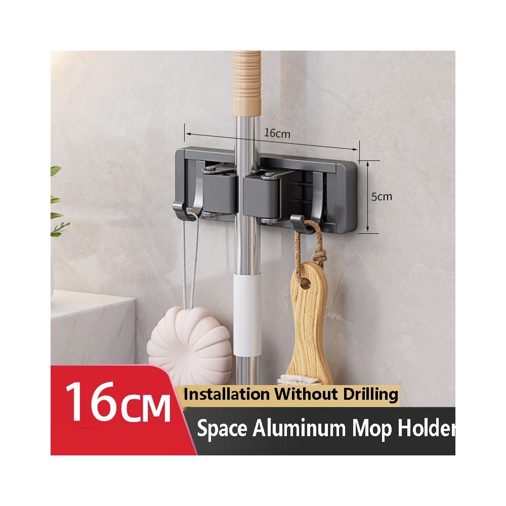 Wall-Mounted Mop Holder Clips in a home organization use case