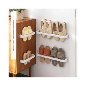 Wall slipper rack holding slippers