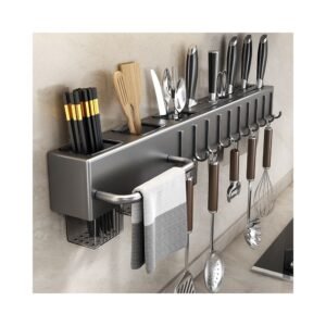 Wall utensil holder mounted in kitchen