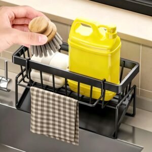 Tap-mounted sink shelf holding kitchen sponge
